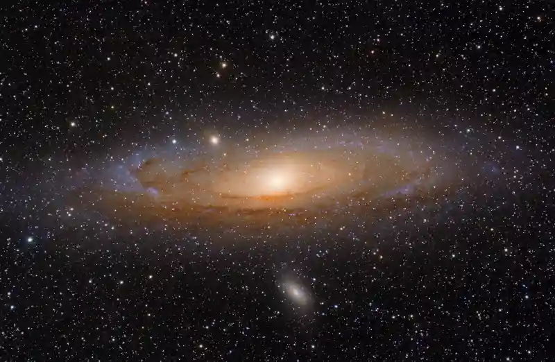 Pictured above is a True Color photograph of the "Great Andromeda Galaxy" and its 2 satellite galaxies, M32 above and M110 below.